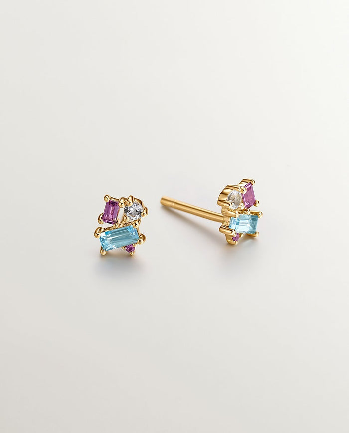 Pendientes de plata 925 bañados en oro amarillo de 18K con topacio azul london y blanco y rodolita rosa