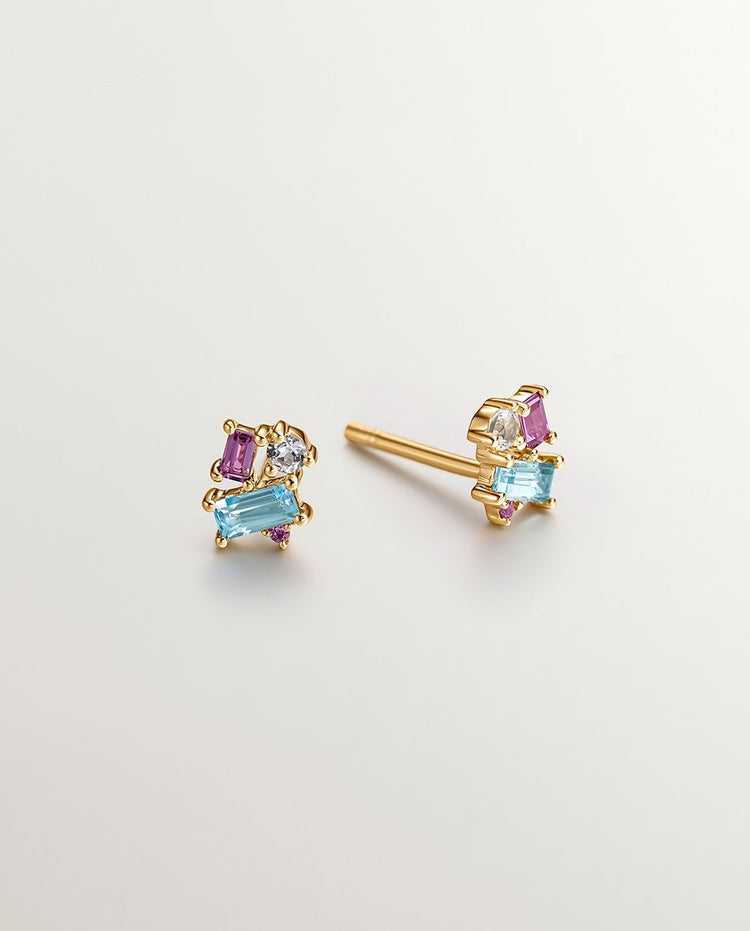 Pendientes de plata 925 bañados en oro amarillo de 18K con topacio azul london y blanco y rodolita rosa