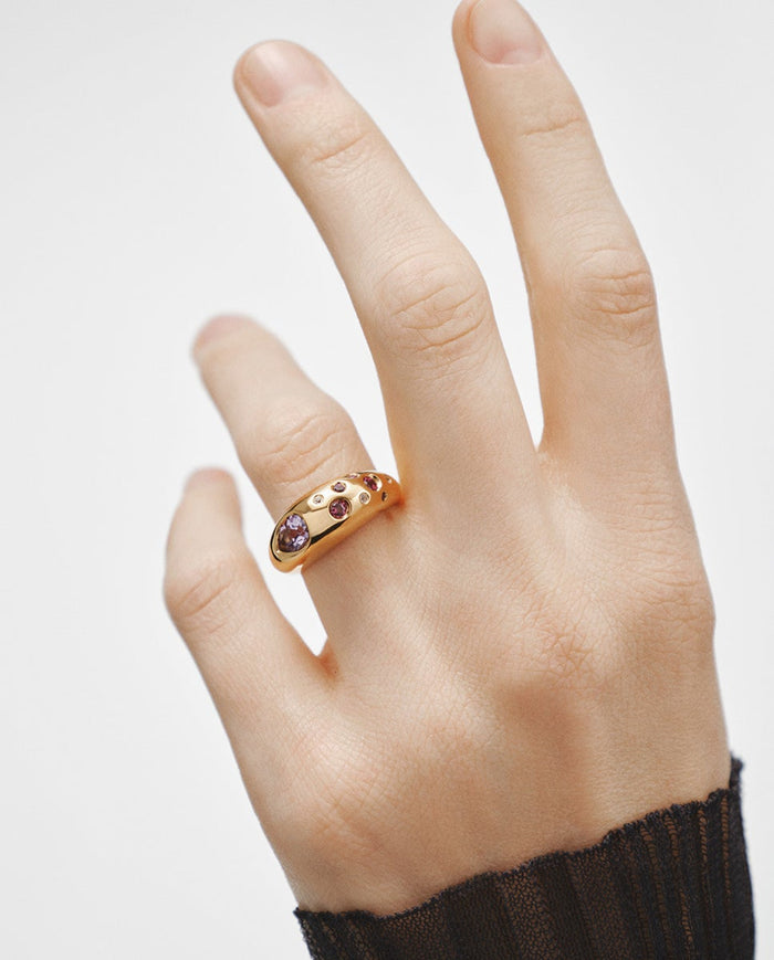 Anillo de plata 925 bañada en oro amarillo de 18K con topacios azul sky y azul london