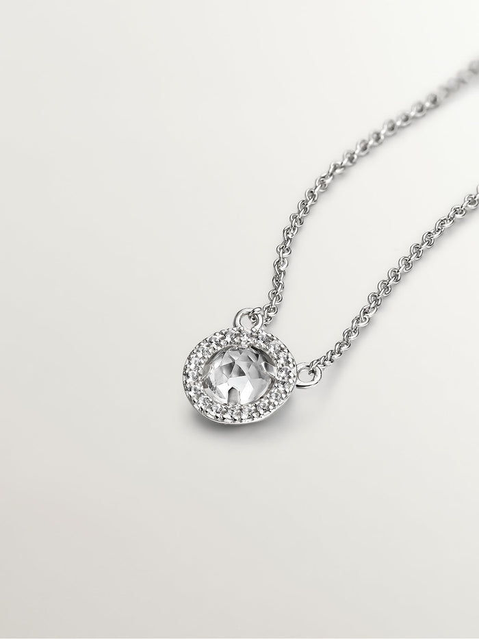 Colgante de plata 925 con topacio blanco y orla de zafiros blancos