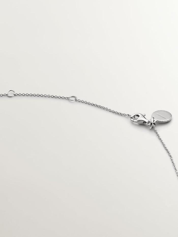 Colgante de plata 925 con topacio blanco y orla de zafiros blancos