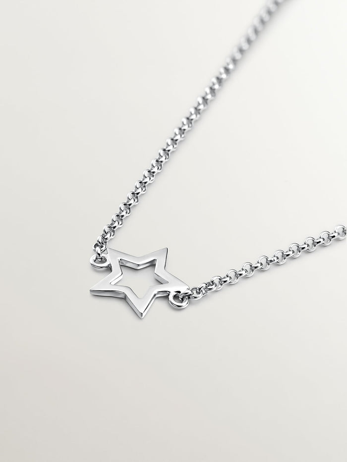 Pulsera estrella hueca plata
