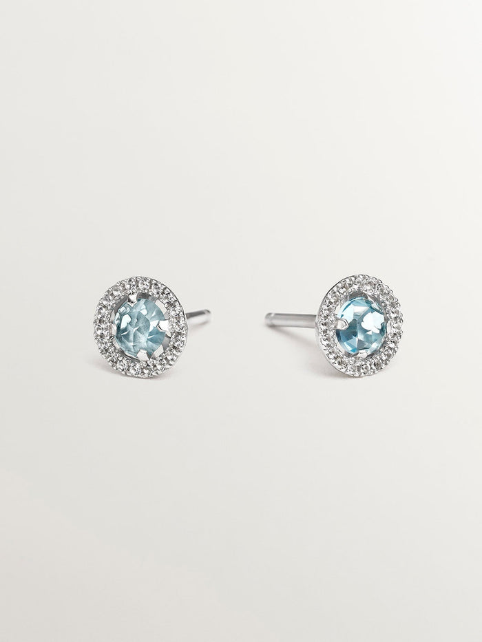 Pendientes de botón de plata 925 cos topacio azul 0,82 cts y orla de zafiros blancos