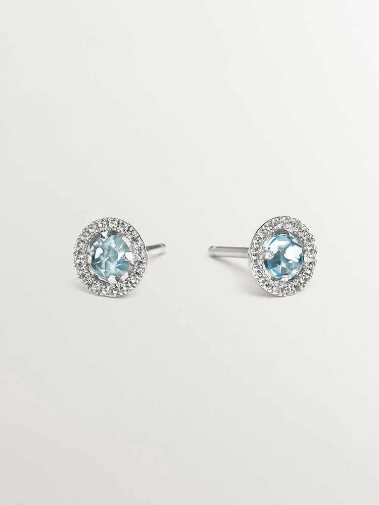 Pendientes de botón de plata 925 cos topacio azul 0,82 cts y orla de zafiros blancos