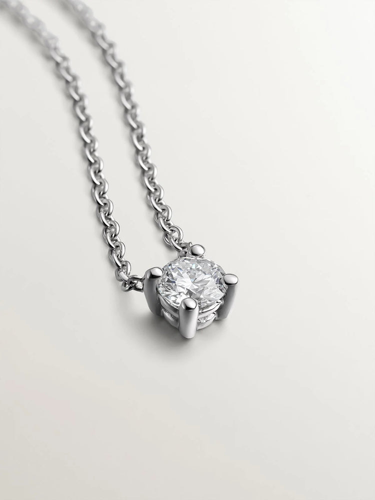 Colgante de oro blanco de 18K con diamante 0,1 cts