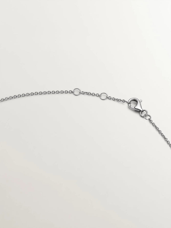 Colgante de oro blanco de 18K con diamante 0,1 cts