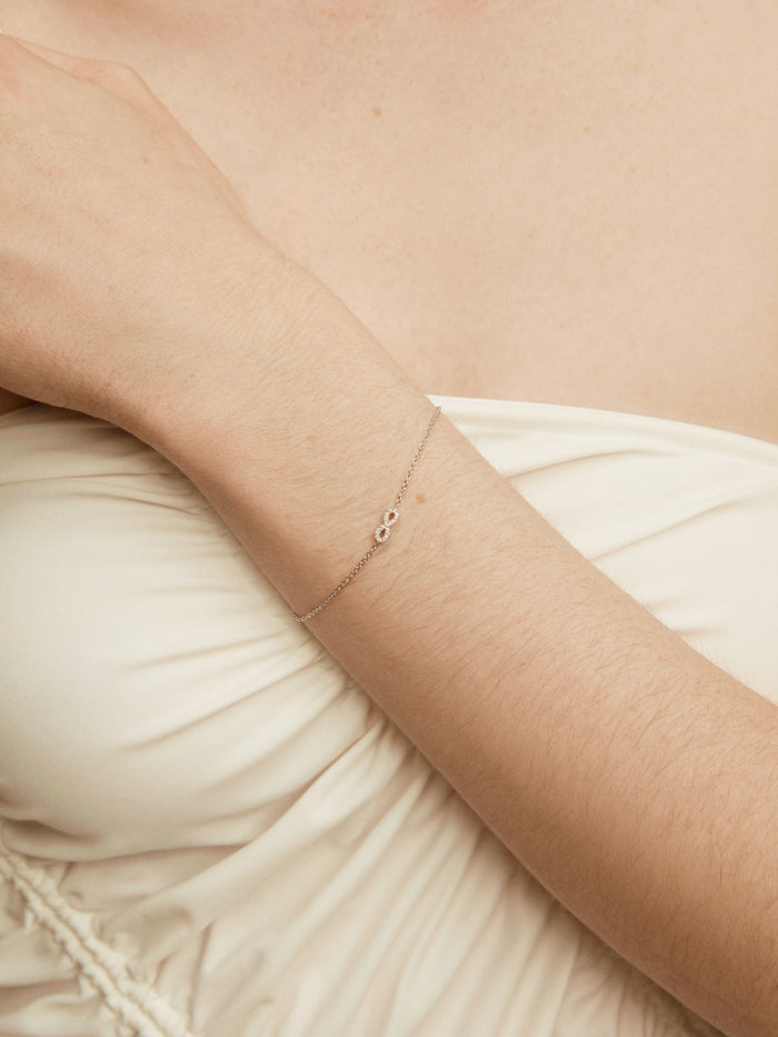 Pulsera infinito diamantes 0,05 ct  oro blanco