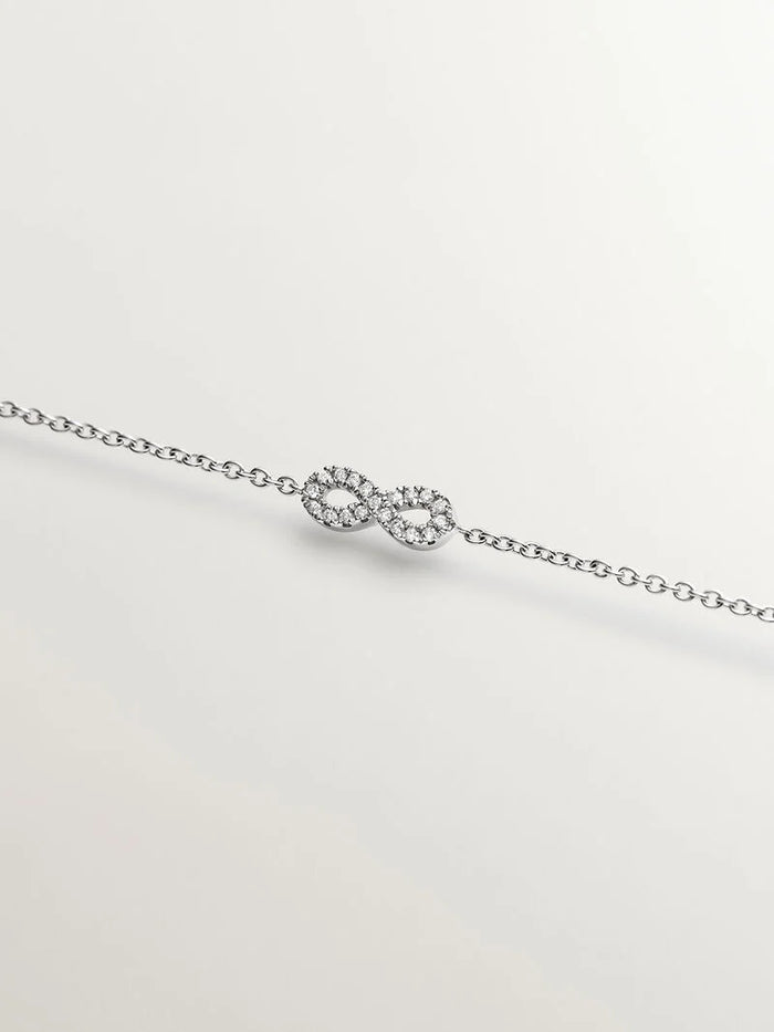 Pulsera infinito diamantes 0,05 ct oro blanco