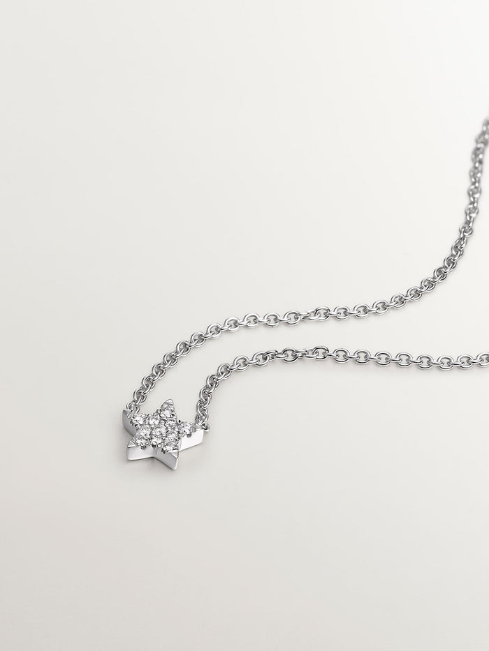 Colgante estrella diamantes 0,06 ct  oro blanco