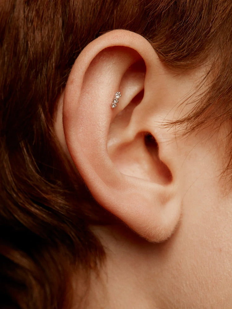 Piercing de oro blanco de 18K con diamantes