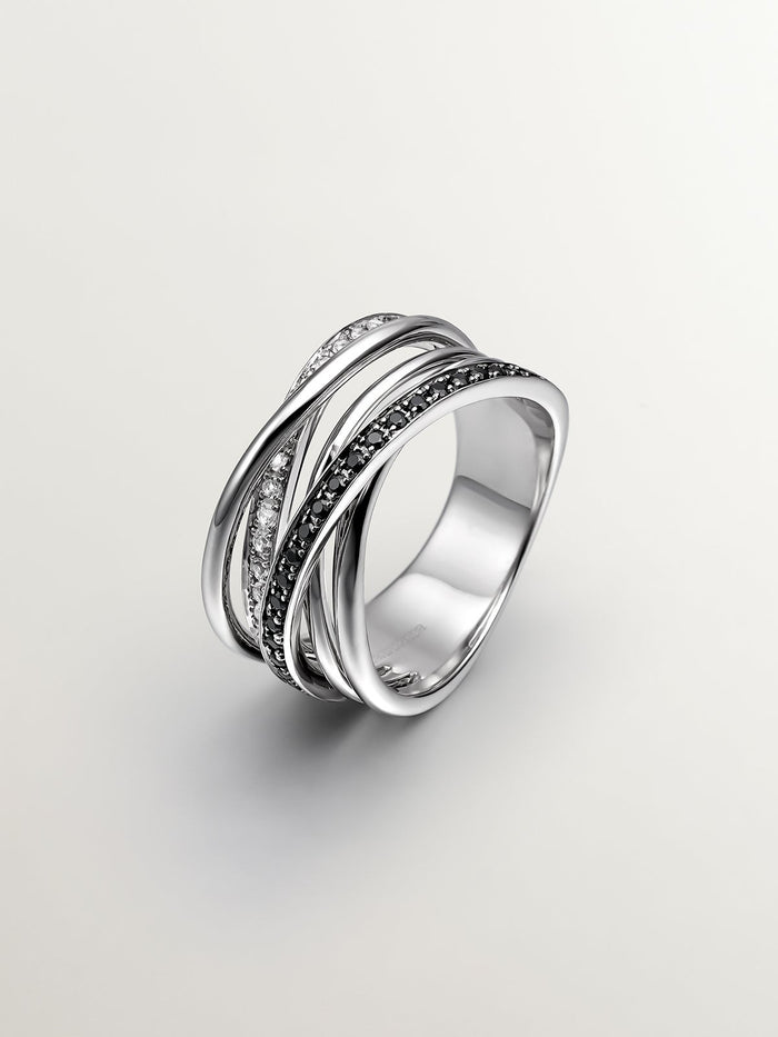 Anillo multibrazo de plata con piedras topacios blancos y espinelas negras