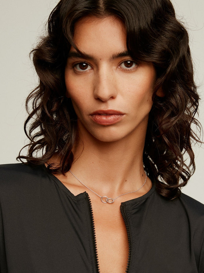 Colgante de plata 925 con círculos y topacios blancos