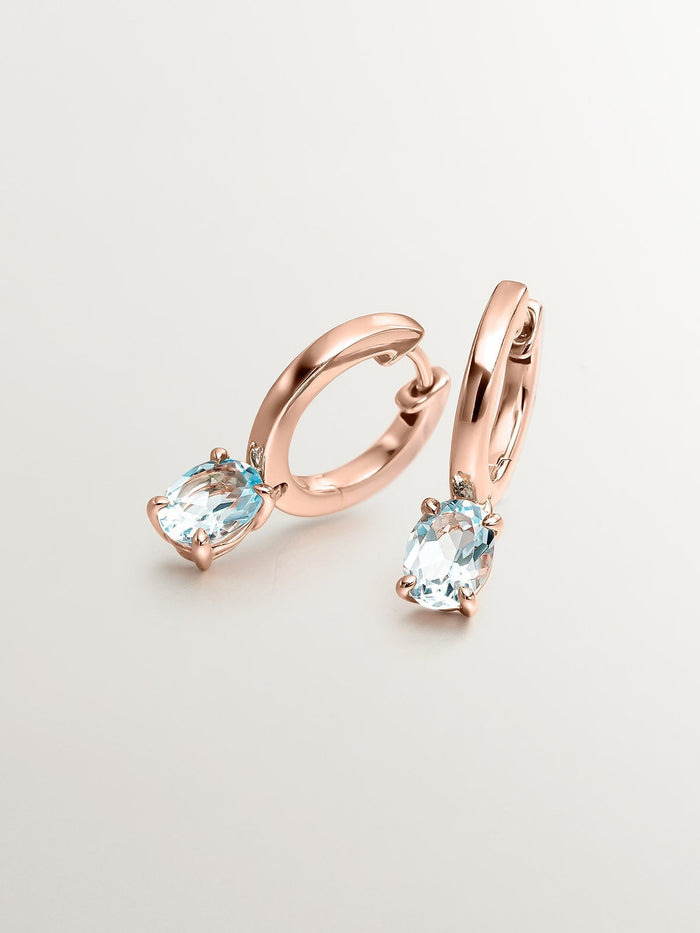 Pendientes de plata 925 bañada en oro rosa de 18K con topacio azul sky