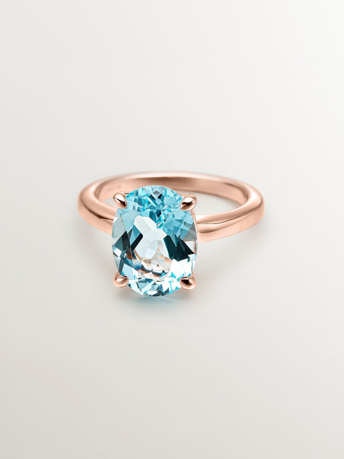 Anillo de plata 925 bañada en oro rosa de 18K con topacio azul sky