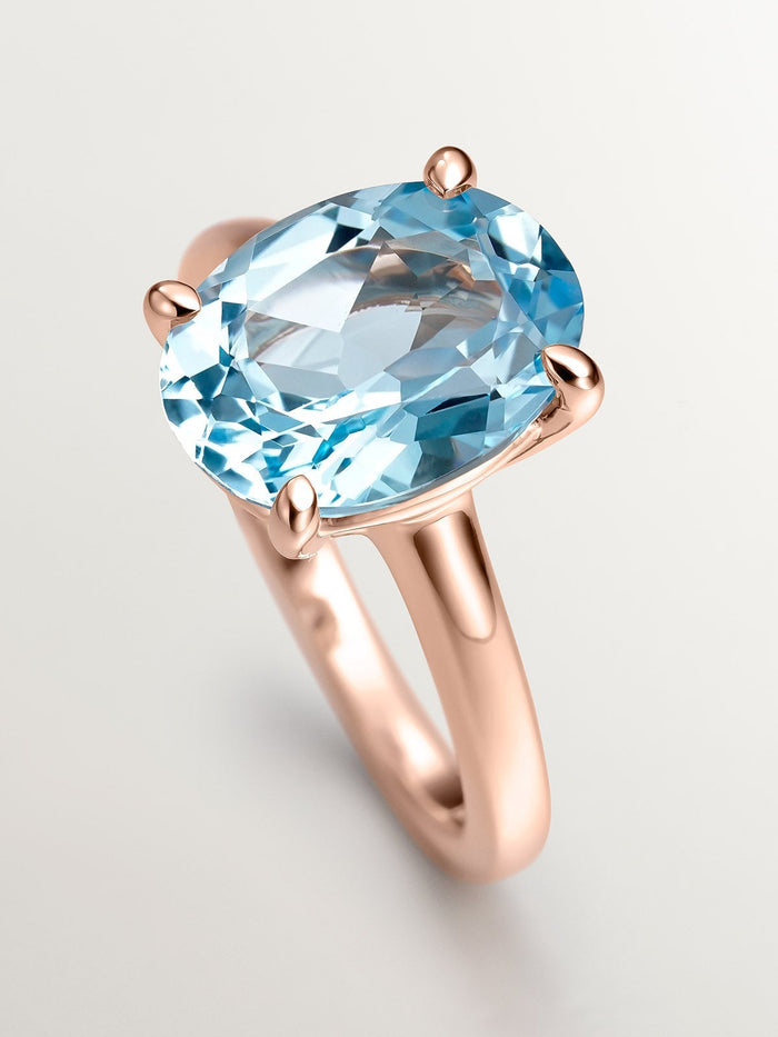 Anillo de plata 925 bañada en oro rosa de 18K con topacio azul sky