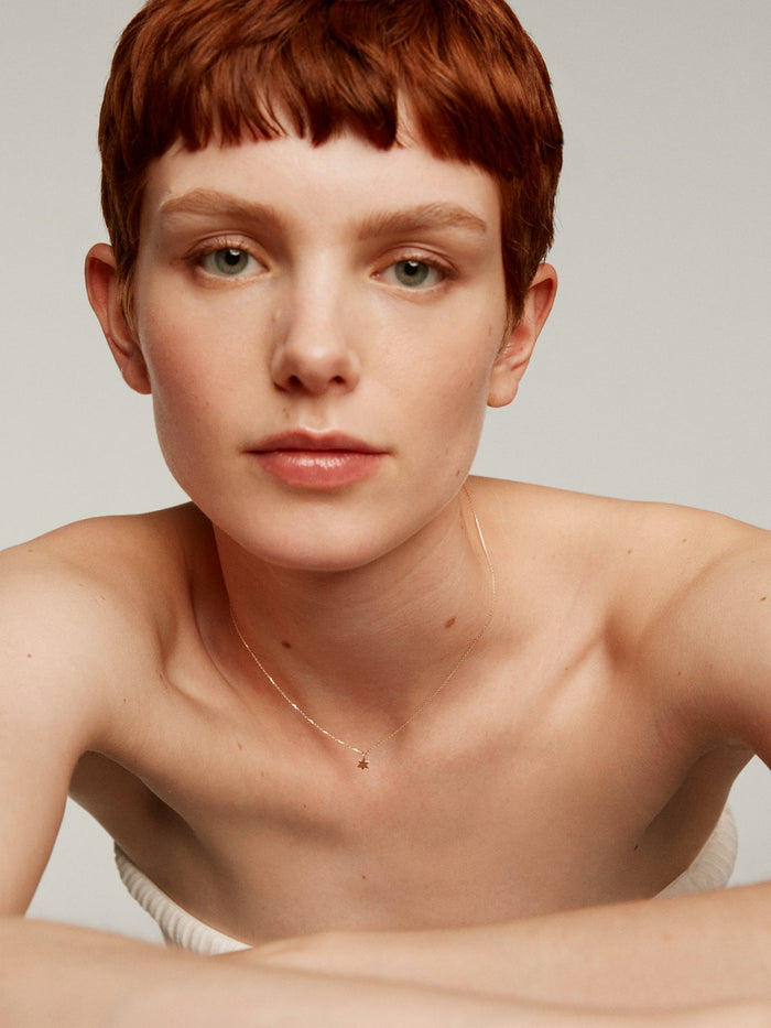 Colgante de oro amarillo de 9K con estrella