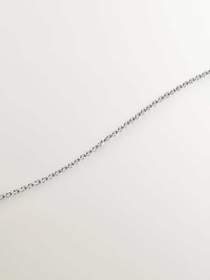 Colgante de oro blanco de 18K con cruz de diamantes