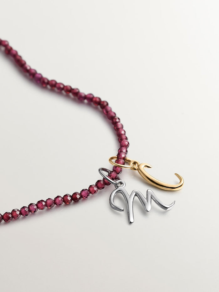 Charm letra C plata recubierta oro  