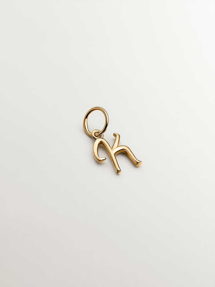 Charm letra K plata recubierta oro  