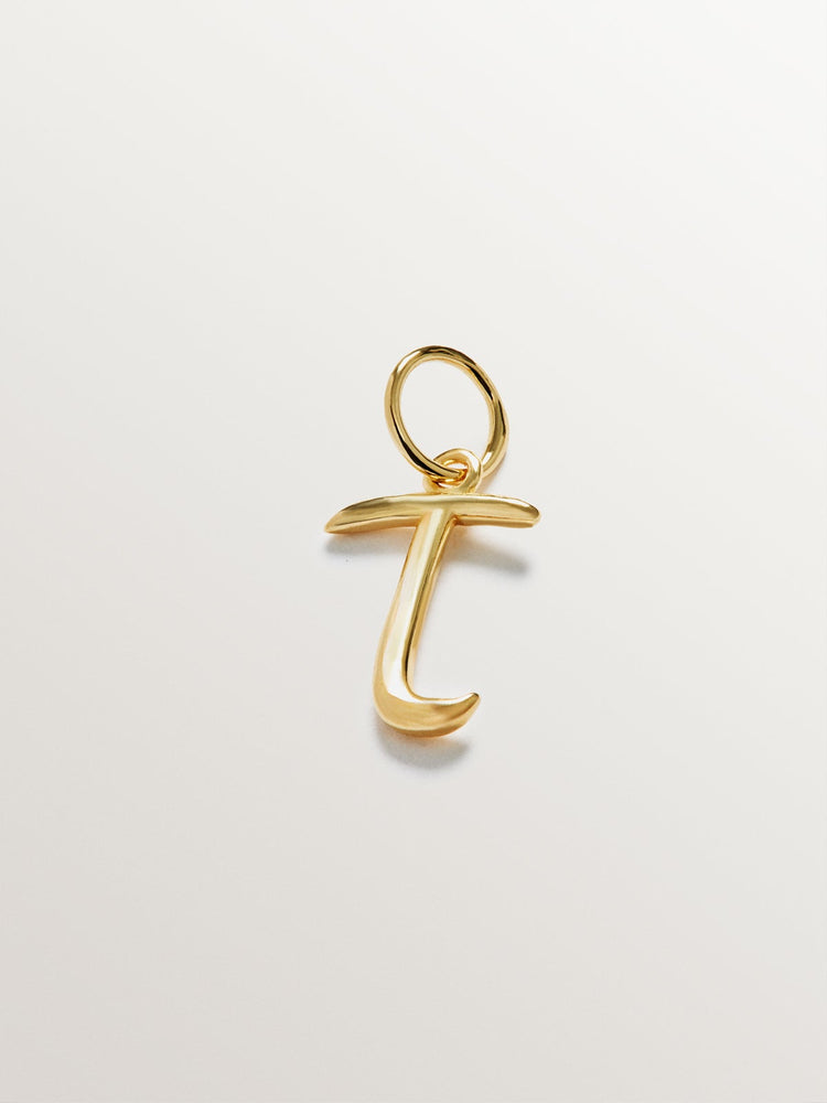 Charm letra T plata recubierta oro  