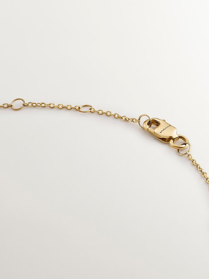 Colgante trébol rubí y diamante oro 9 kt