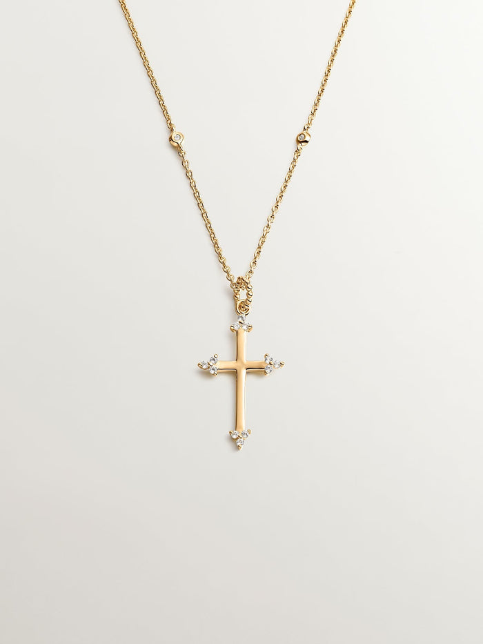 Colgante de plata 925 bañada en oro amarillo de 18K con cruz y topacios blancos