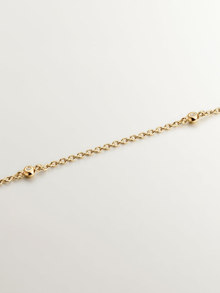 Colgante de plata 925 bañada en oro amarillo de 18K con cruz y topacios blancos