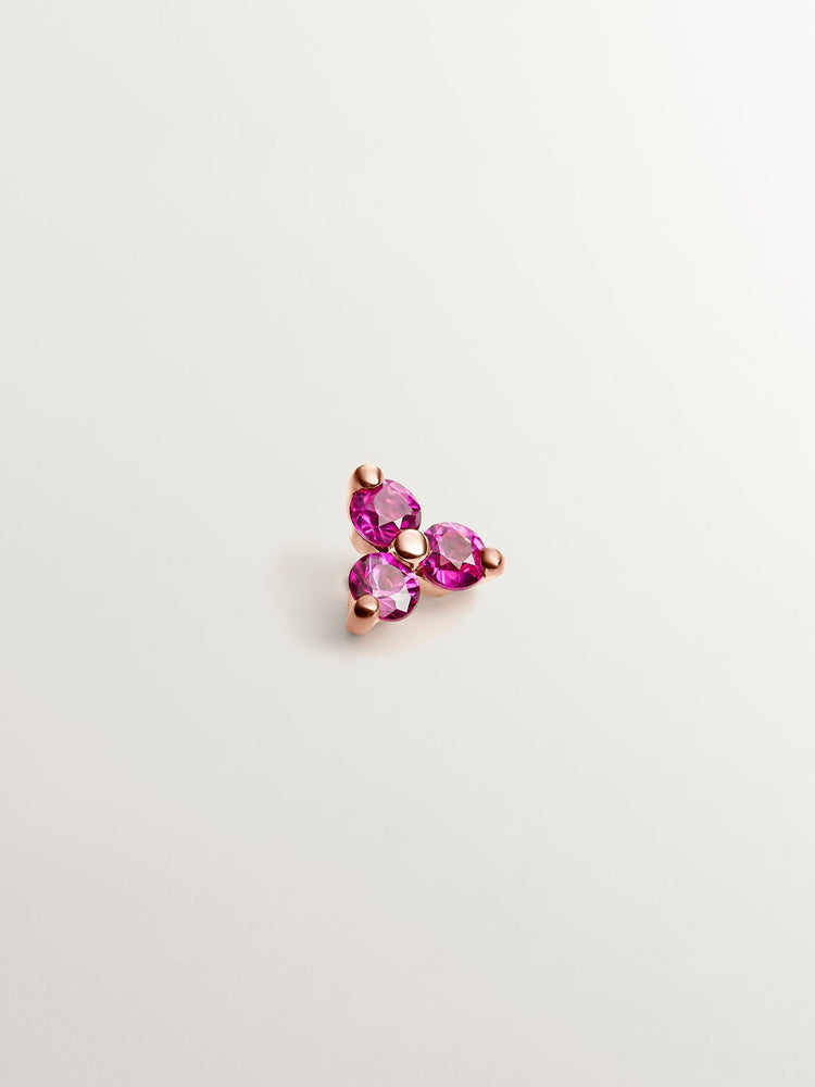 Pendiente individual de oro rosa de 18K con rubíes