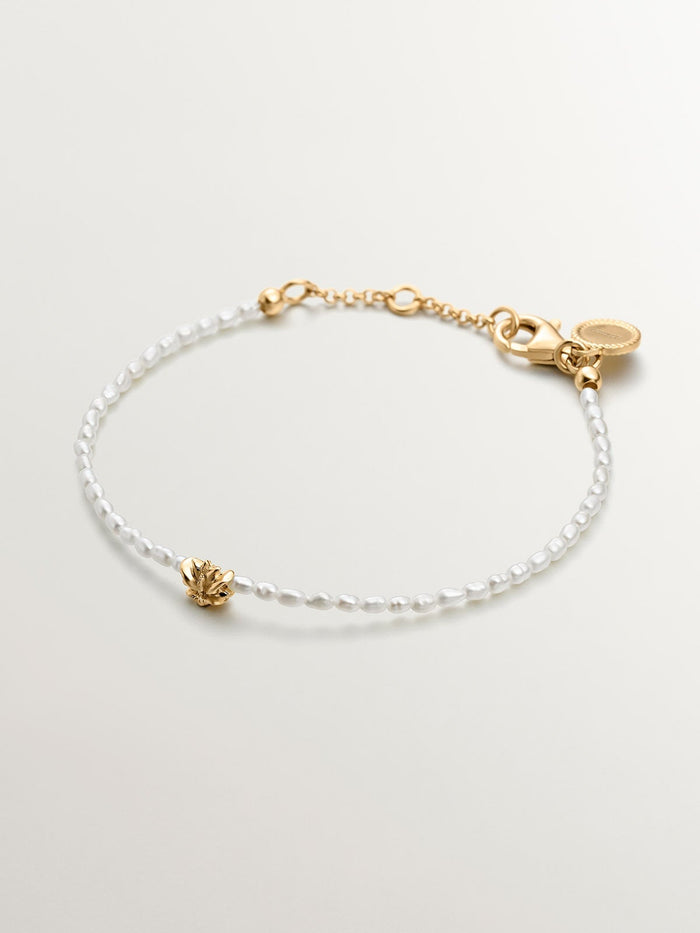 Pulsera motivo flor perla plata recubierta oro