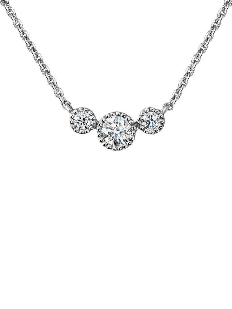 Colgante de oro blanco de 18K con triple diamante 0,097 cts