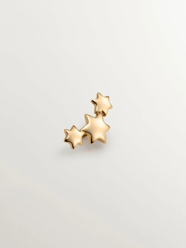 Piercing de oro amarillo de 18K con triple estrella