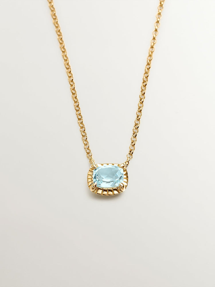 Colgante de plata 925 bañada en oro amarillo de 18K con topacio azul sky