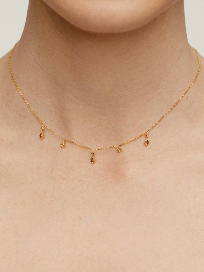 Collar de plata 925 bañada en oro amarillo de 18K con rodolitas y topacios