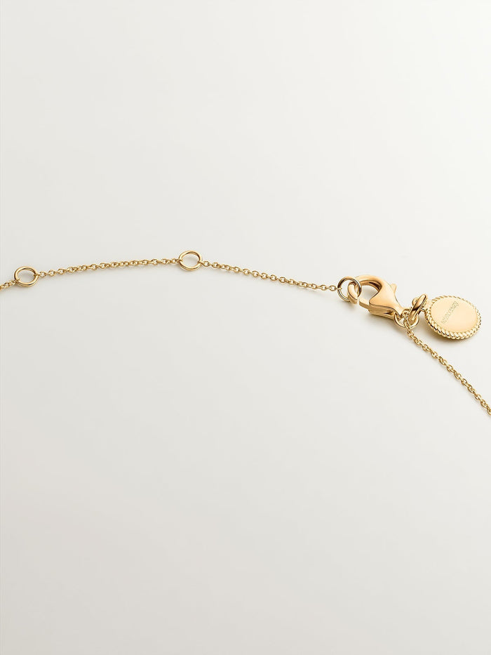 Collar de plata 925 bañada en oro amarillo de 18K con rodolitas y topacios