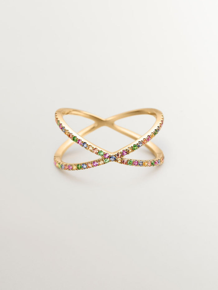 Anillo multibrazo de oro con zafiros y tsavoritas.