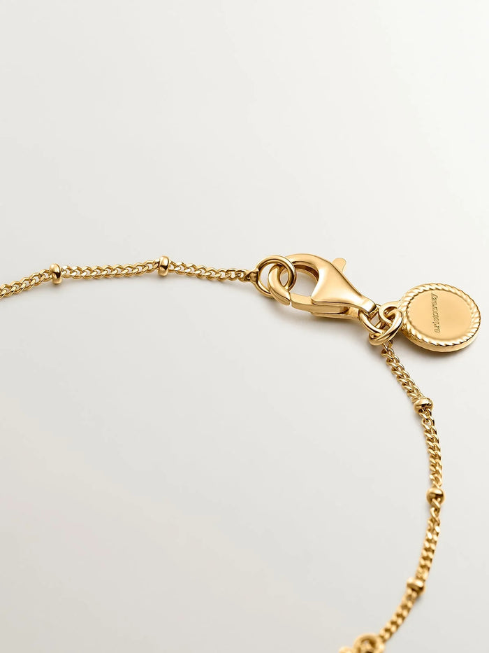 Pulsera de plata 925 bañada en oro amarillo de 18K con lunas y estrellas