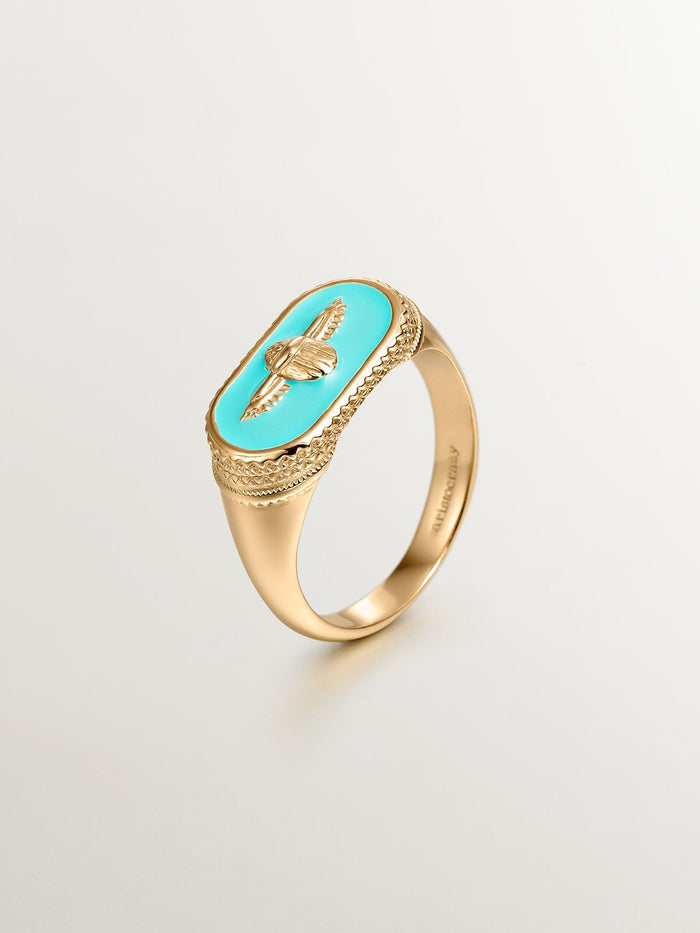 Anillo sello escarabajo de plata bañada en oro amarillo de 18kt con esmalte verde