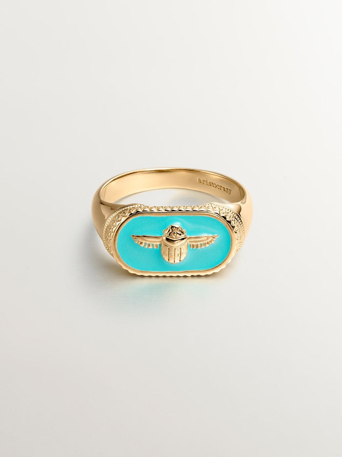 Anillo sello escarabajo de plata bañada en oro amarillo de 18kt con esmalte verde
