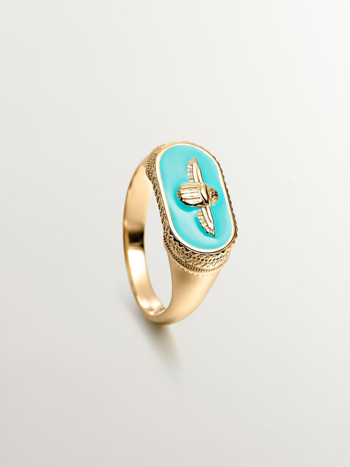 Anillo sello escarabajo de plata bañada en oro amarillo de 18kt con esmalte verde