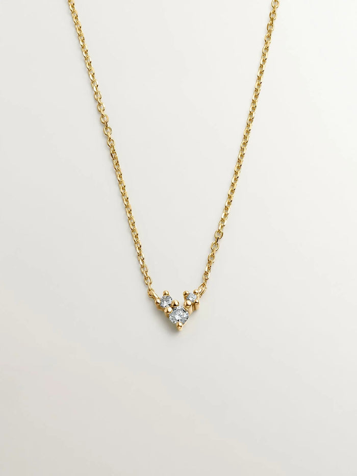 Colgante de oro amarillo de 18K con tres diamantes