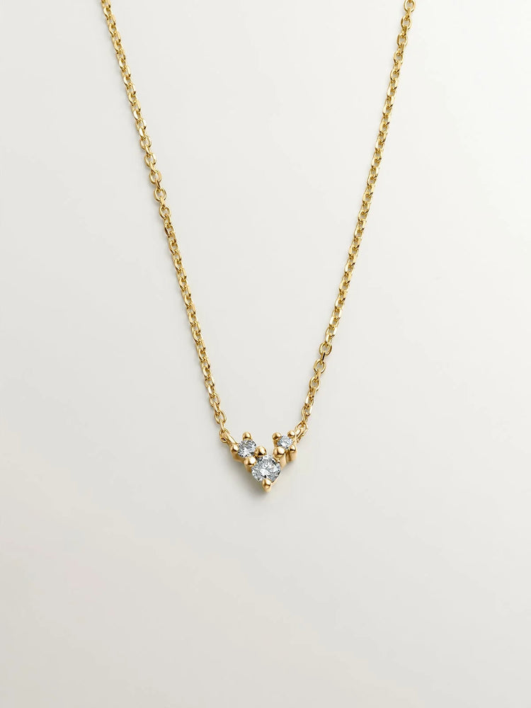 Colgante de oro amarillo de 18K con tres diamantes