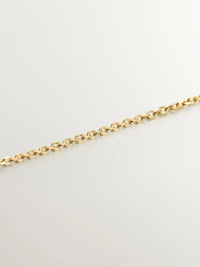 Colgante de oro amarillo de 18K con tres diamantes