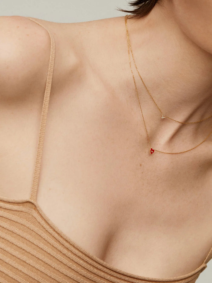 Colgante de oro amarillo de 18K con tres diamantes