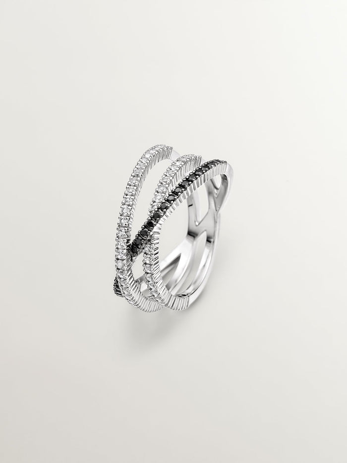 Anillo triple cruzado de plata con piedras topacios blancos y espinelas negras