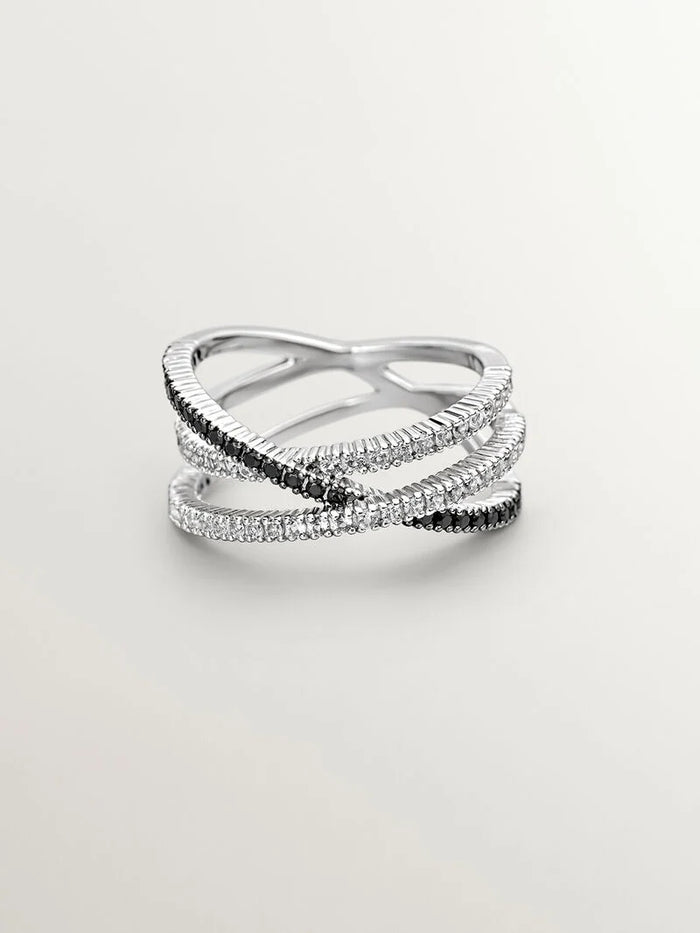 Anillo triple cruzado de plata con piedras topacios blancos y espinelas negras