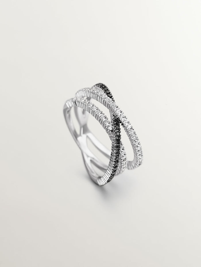 Anillo triple cruzado de plata con piedras topacios blancos y espinelas negras