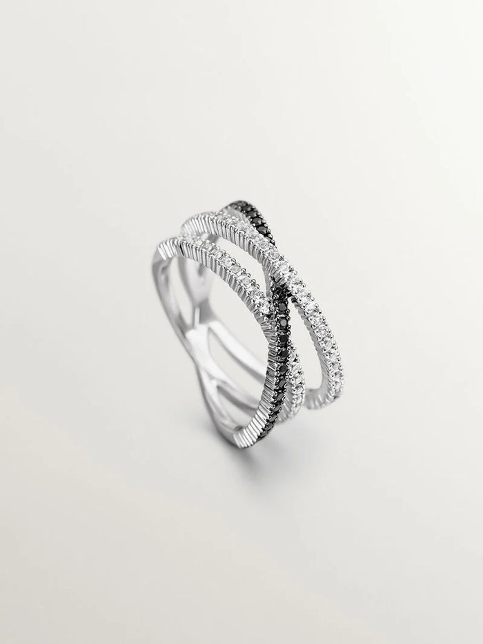 Anillo triple cruzado de plata con piedras topacios blancos y espinelas negras
