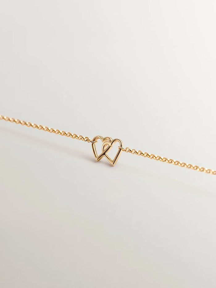 Pulsera corazones unidos oro 9 kt