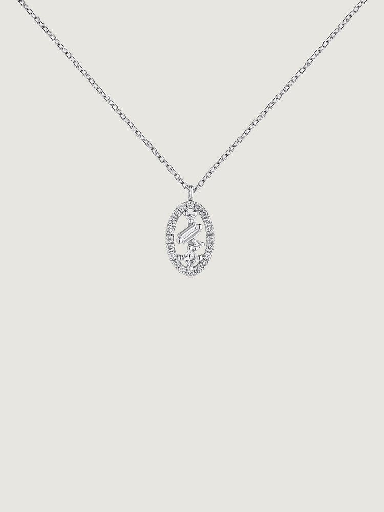 Colgante ovalado de oro blanco de 18kt con diamantes y orla de diamantes