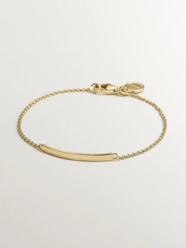 Pulsera esclava de plata bañada en oro amarillo de 18kt con corazón interior